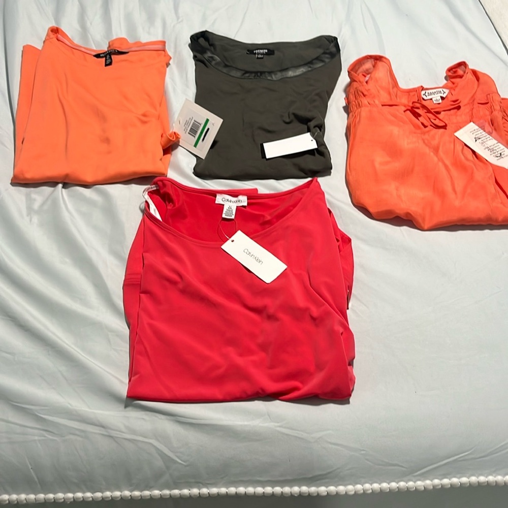 4 size large woman's brand new blouses/shirts